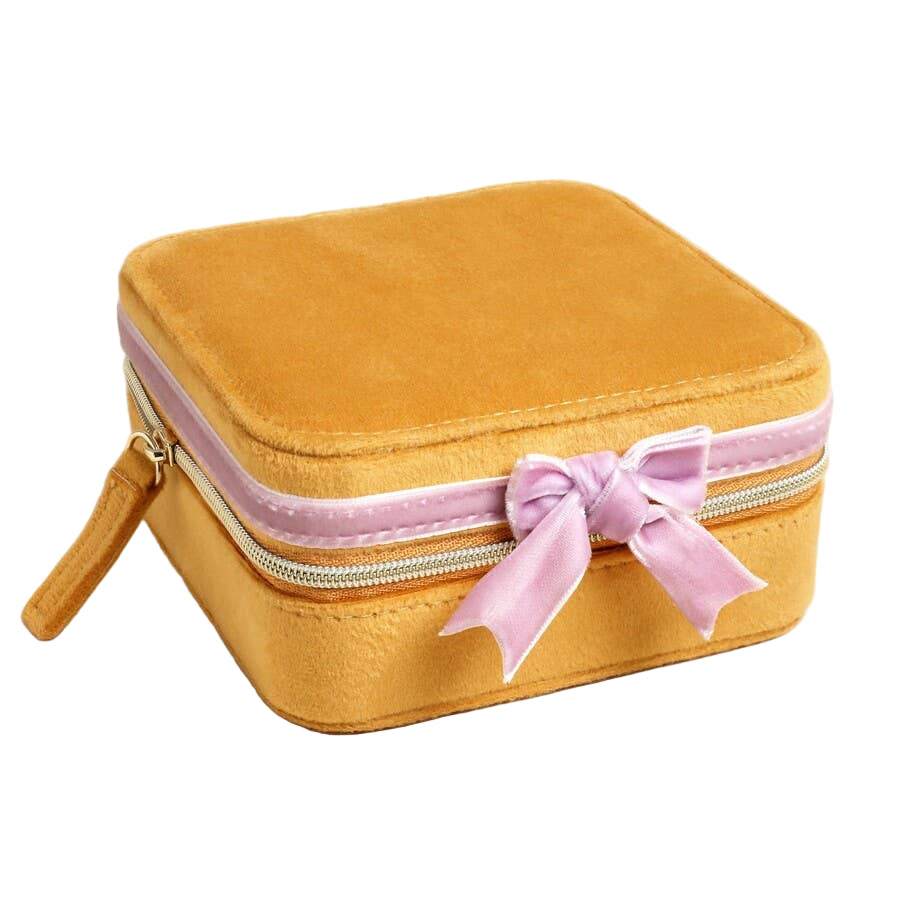 Mustard velvet jewelry box with a pink bow