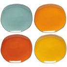 Four colorful pebble side plates in teal, orange, red, and yellow.